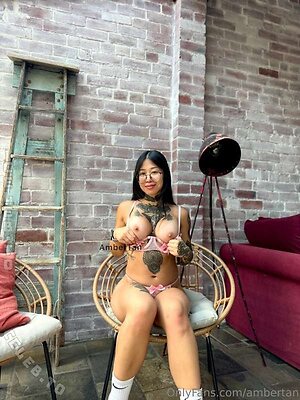 Amber Tan with DD cups photo