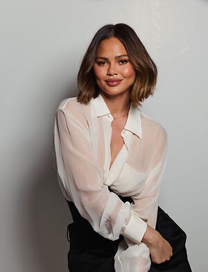 Chrissy Teigen braless See through leaked photo #2