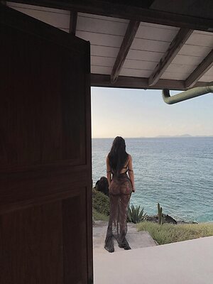 Kim Kardashian in see through outfit