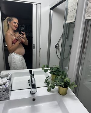 Teresa Palmer taking selfie in bra
